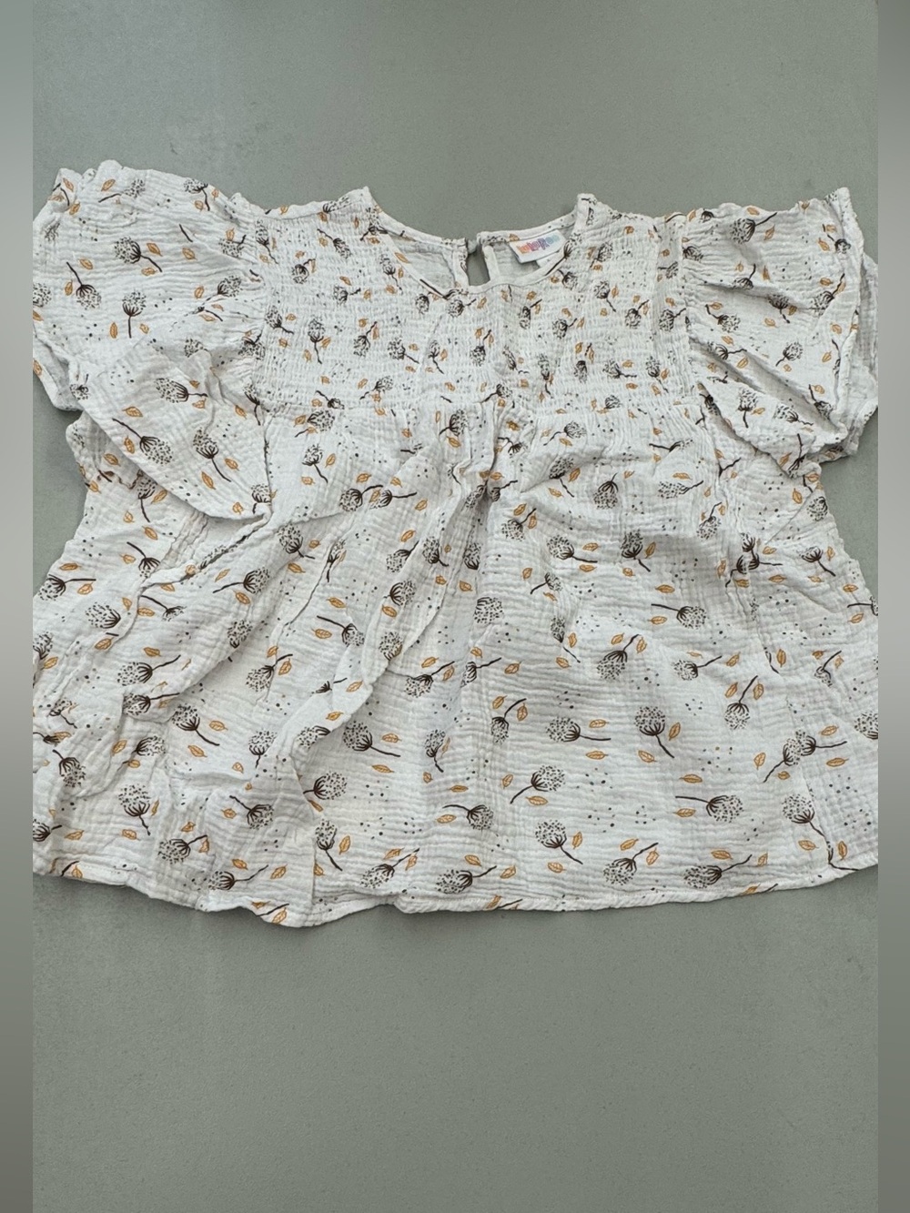 LuLaRoe White Floral Smocked Yoke Blouse with Mustard Accents